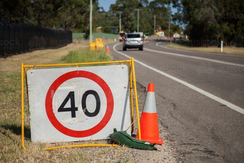 40 roadwork speed limit sign on road - Australian Stock Image