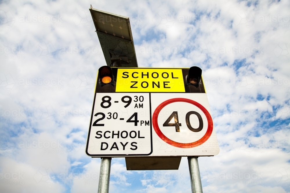 40 School zone sign with lights on - Australian Stock Image