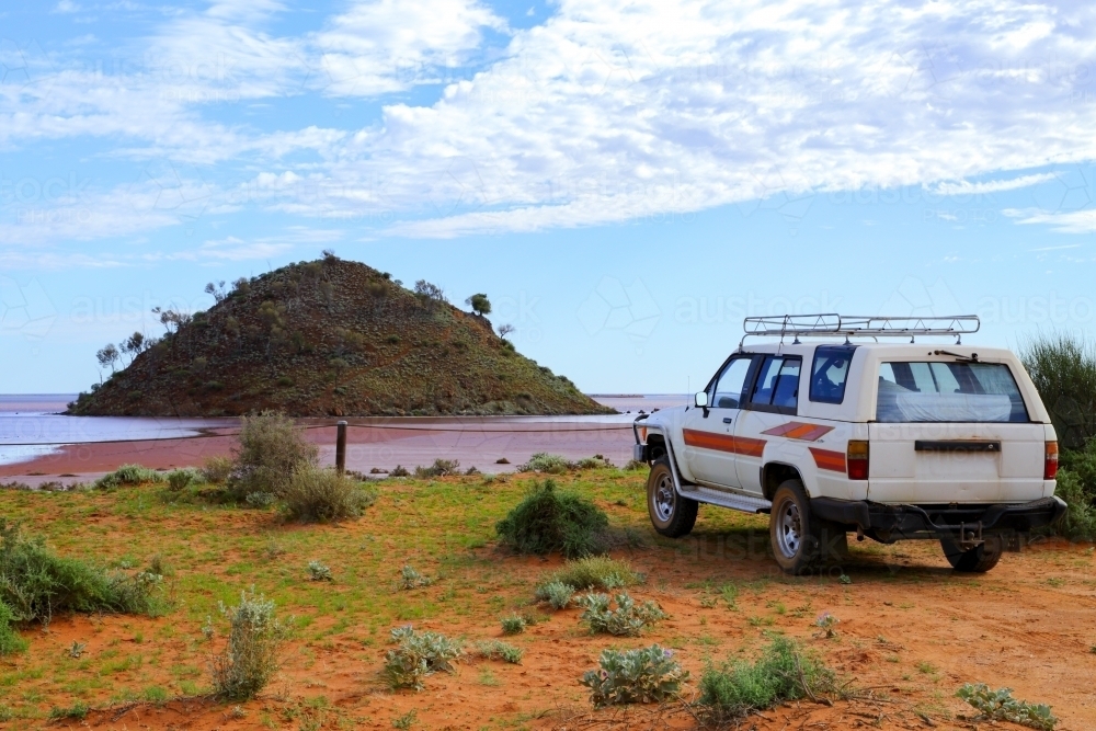 4WD on the shoreline of Lake Ballard, WA - Australian Stock Image