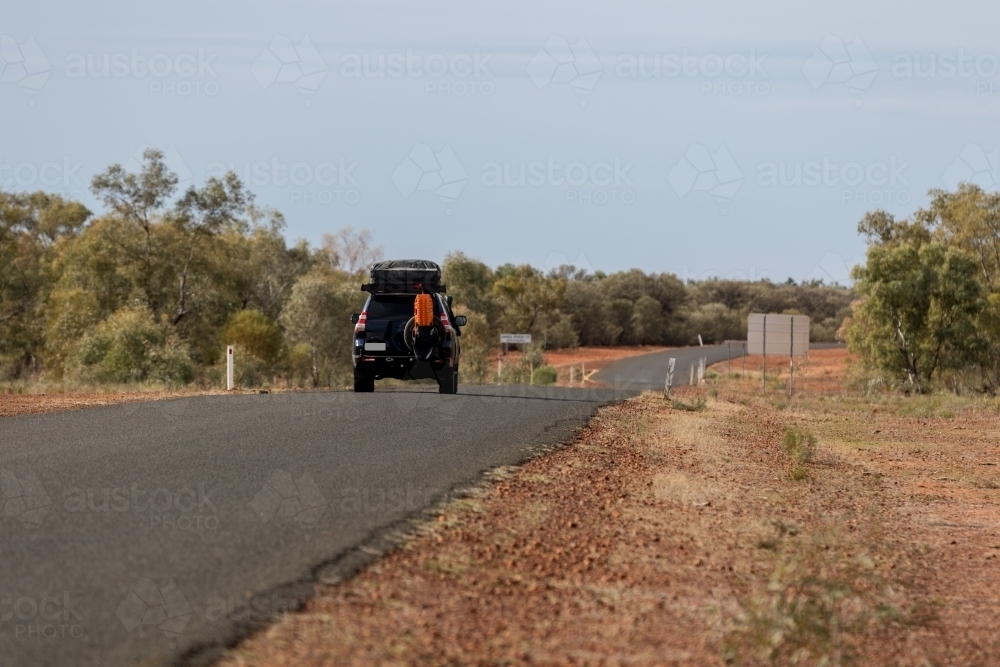 4WD travelling along unsealed country road - Australian Stock Image