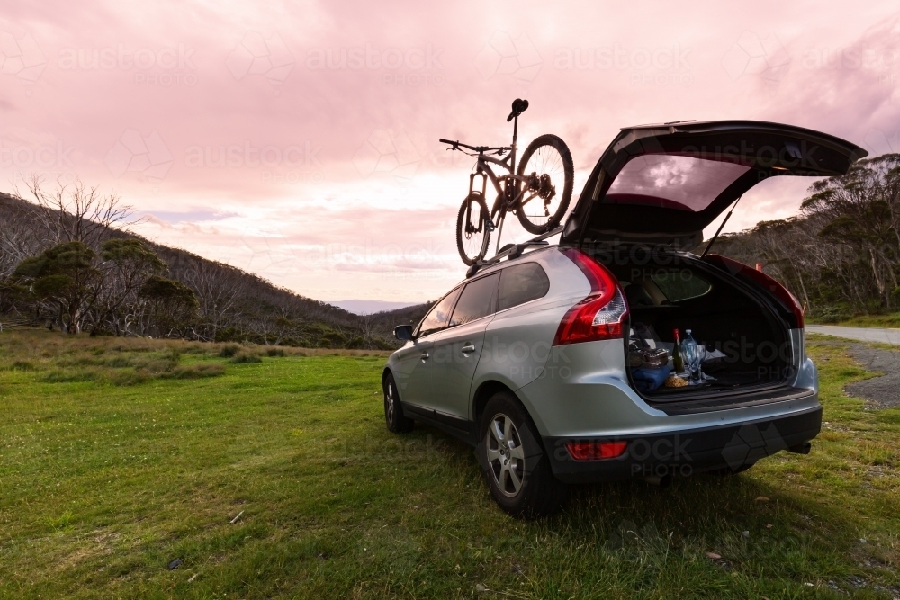4WD with mountain bike parked and enjoying the view - Australian Stock Image