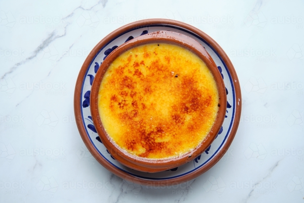 A bowl of crème brûlée - Australian Stock Image