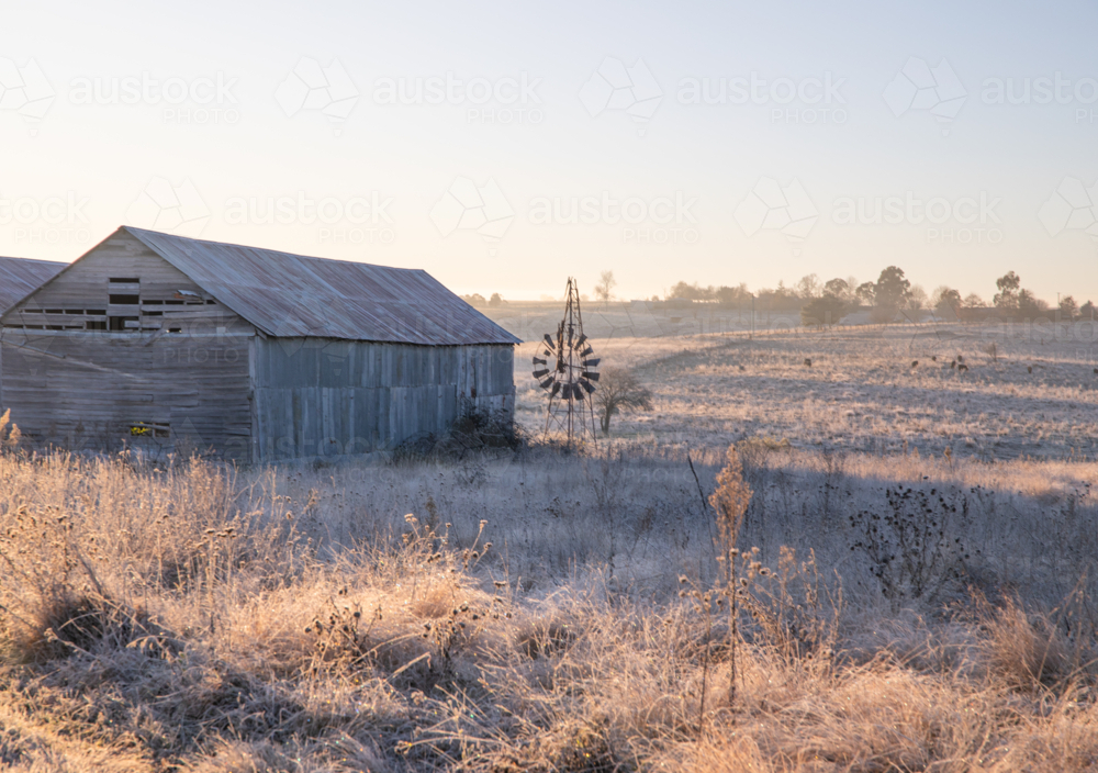 A broken windmill, an old shed and a winter's morning - Australian Stock Image