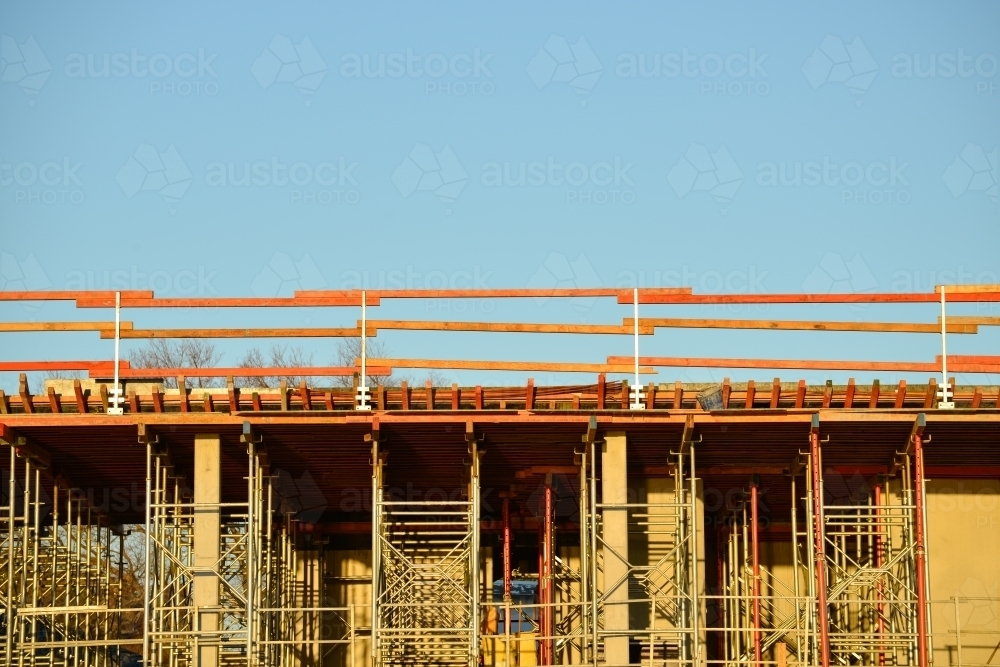 A building construction site bathed in golden sunlight - Australian Stock Image