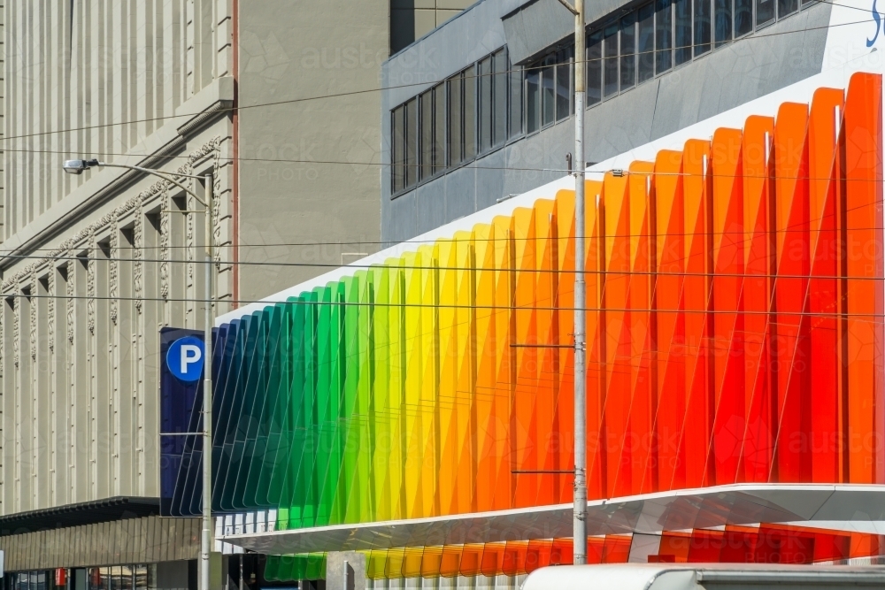 Image of A building facade made up of rainbow coloured panels ...
