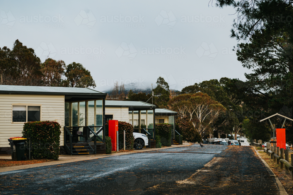 a camping site road with lodges on a winter day - Australian Stock Image