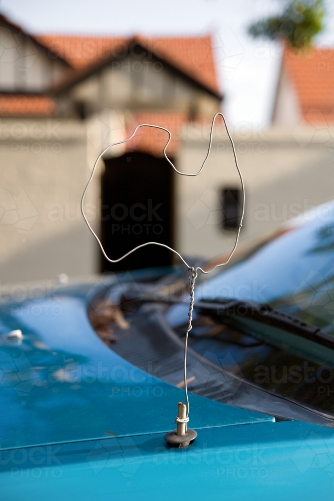 A car antenna made out of a coat hanger and shaped like a map of Australia - Australian Stock Image
