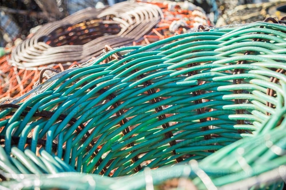A close up of colourful lobster traps - Australian Stock Image