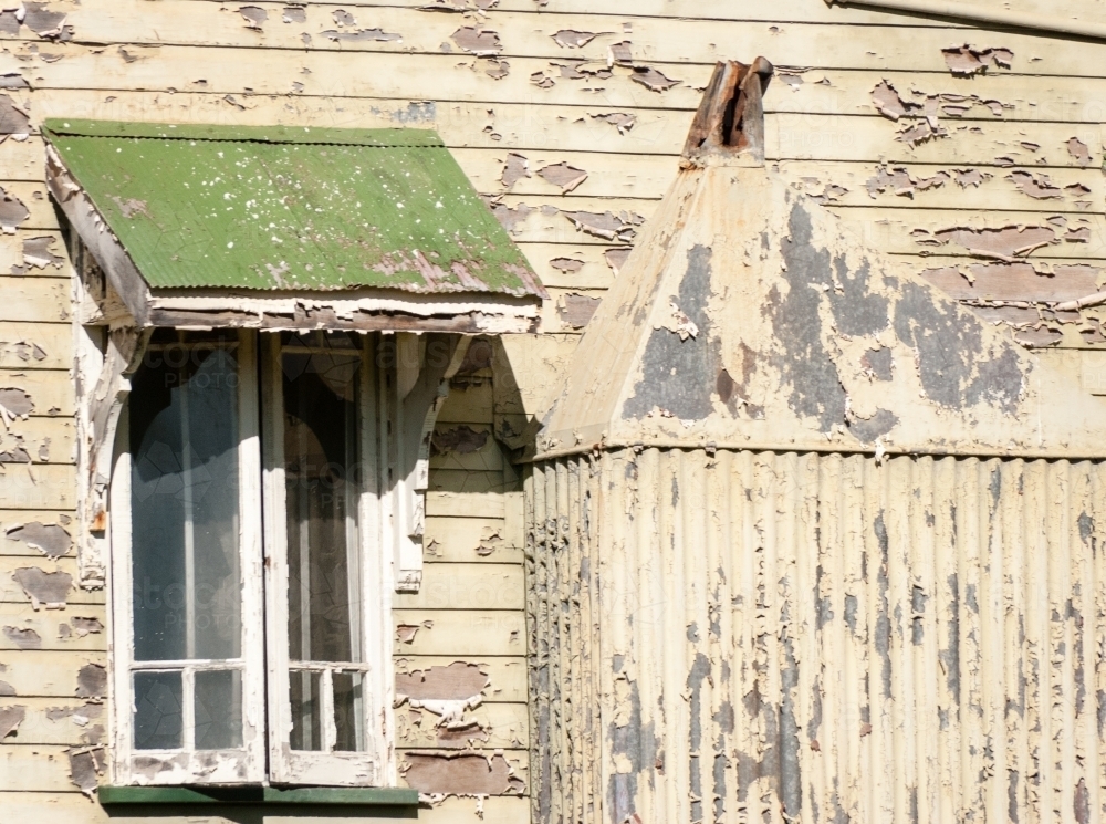 A close up of Peeling Paint on an old Queenslander Style House. - Australian Stock Image