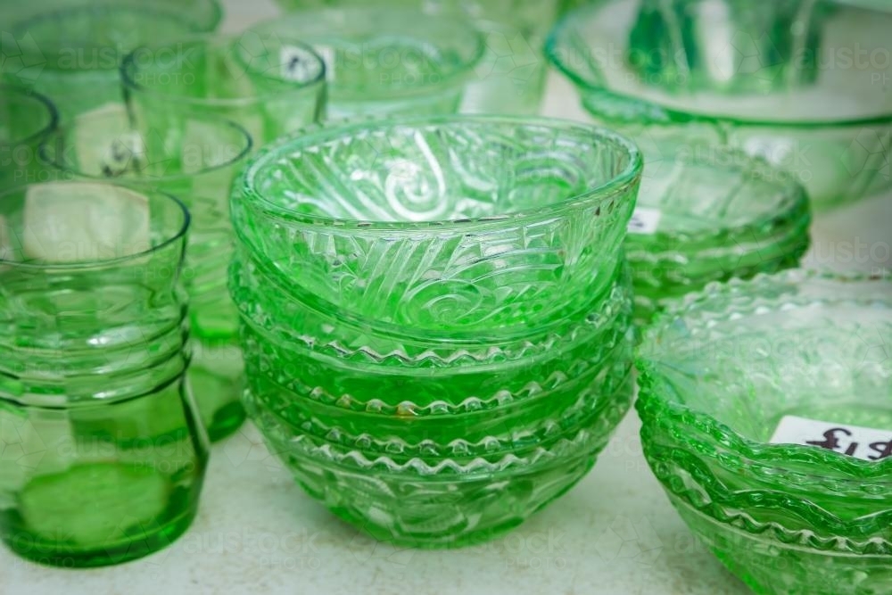 A collection of green glass crockery - Australian Stock Image