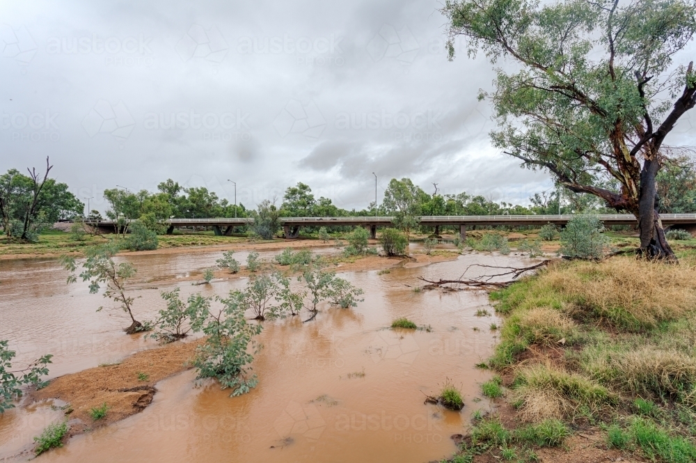 A flooded Todd River - Australian Stock Image