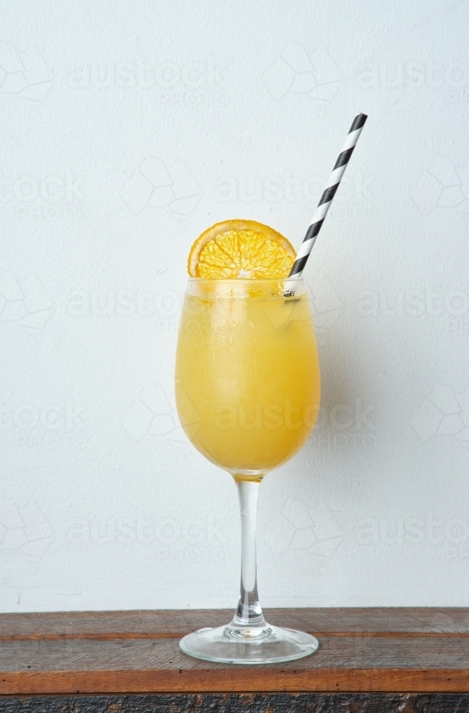 Image of A glass of screwdriver cocktail Austockphoto