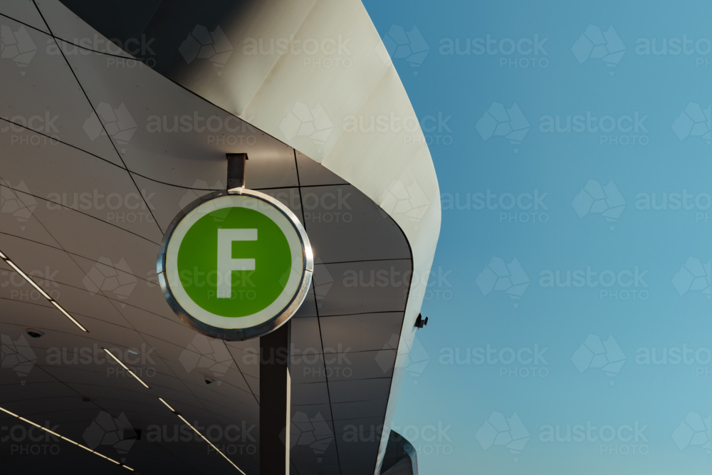 A green ferry wayfinding sign at Barangaroo Wharf, NSW - Australian Stock Image