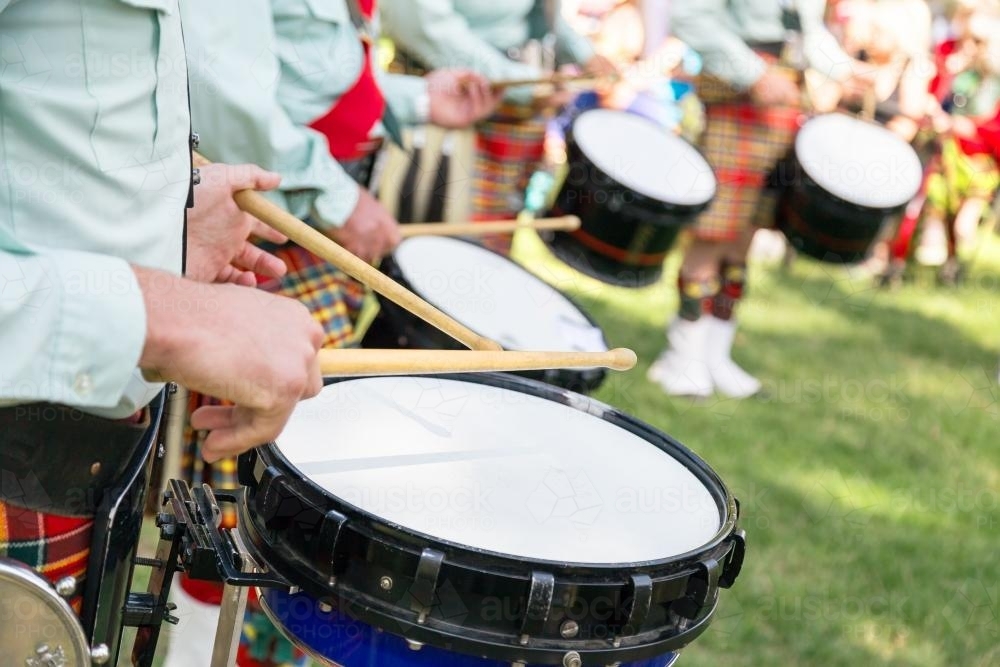 A group of drummers from a highland band perform - Australian Stock Image