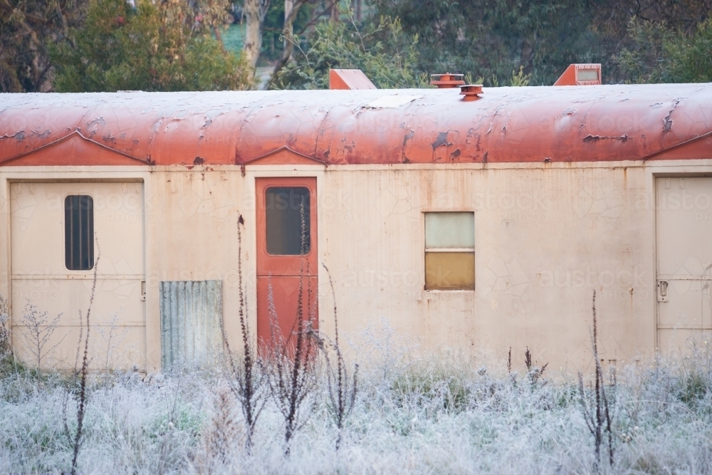 A heavy frost covering a disused railway carriage - Australian Stock Image