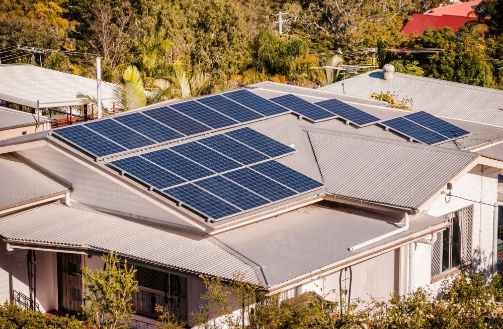 A House with Solar Panels on the Roof - Australian Stock Image