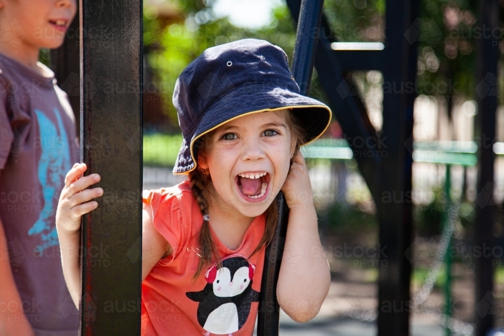 A kid playing at the playground - Australian Stock Image