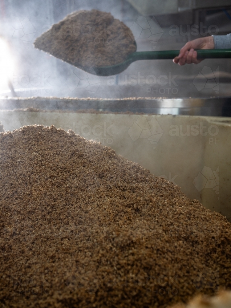 A large container being filled with grain - Australian Stock Image