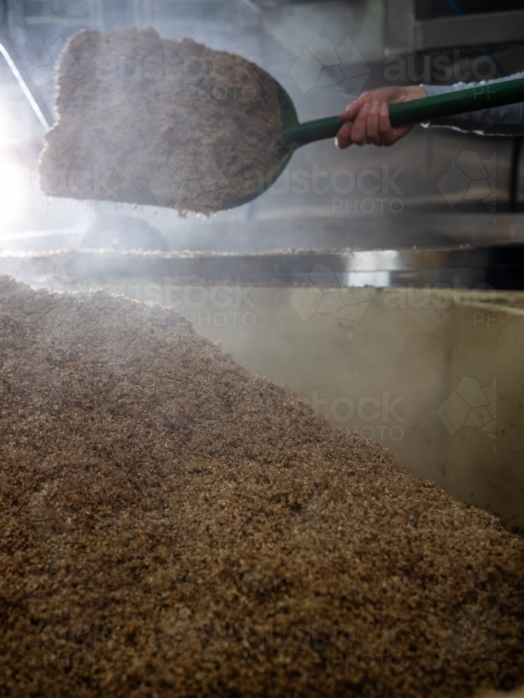 A large container being filled with grain - Australian Stock Image