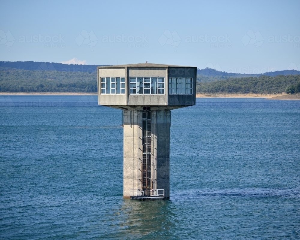 A large control tower in a freshwater reservoir - Australian Stock Image