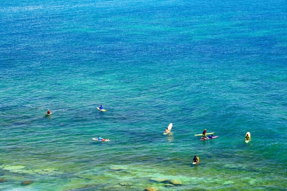 A large group of surfers at Moffat Beach, Caloundra, on the Sunshine Coast - Australian Stock Image
