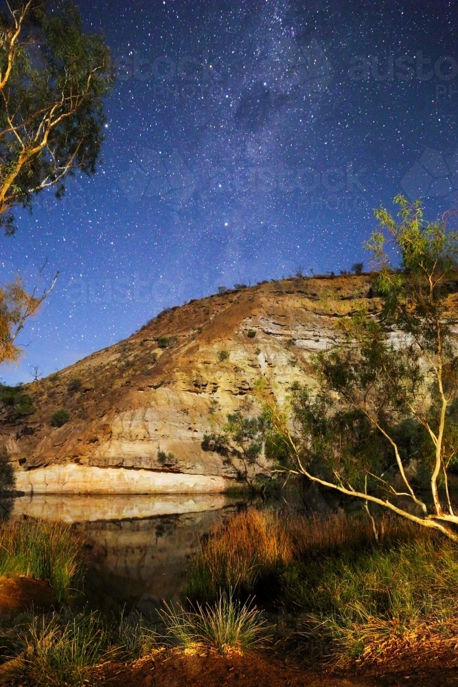 A light-painting plus the Milky Way stars at Ellendale Pool near Geraldton, WA. - Australian Stock Image