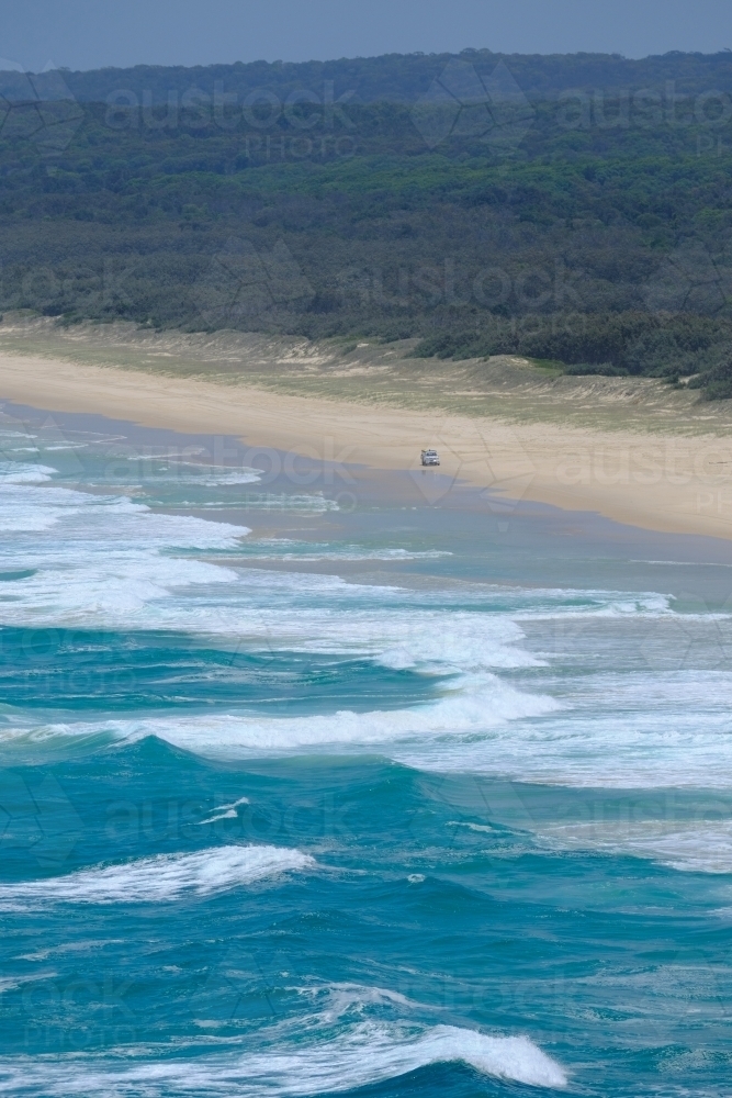 A lone 4wd on Main Beach - Australian Stock Image