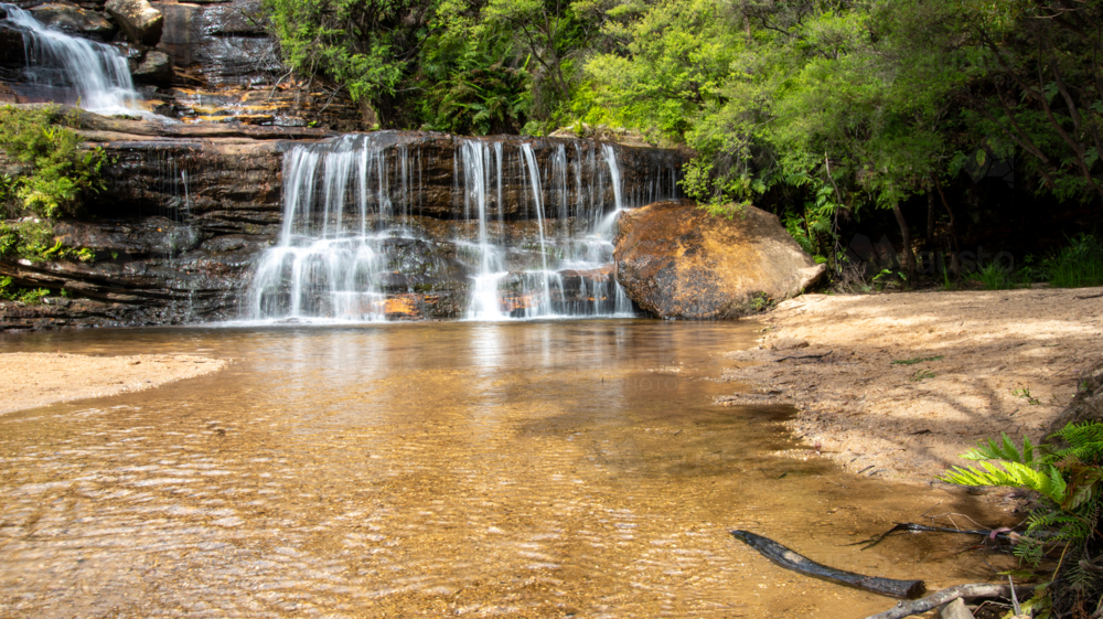 A long exposure of a waterfall near Wentworth Falls in the Blue Mountains - Australian Stock Image