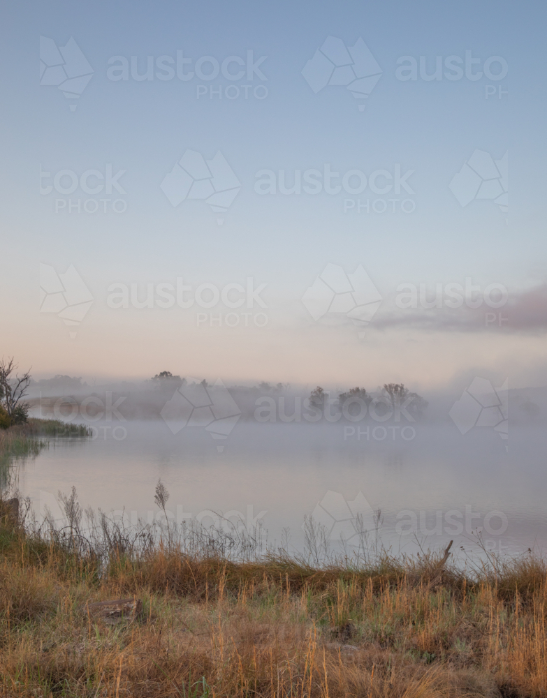 A misty morning on an inland country dam - Australian Stock Image