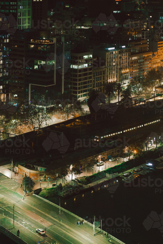 A moody nighttime cityscape along the coast. - Australian Stock Image
