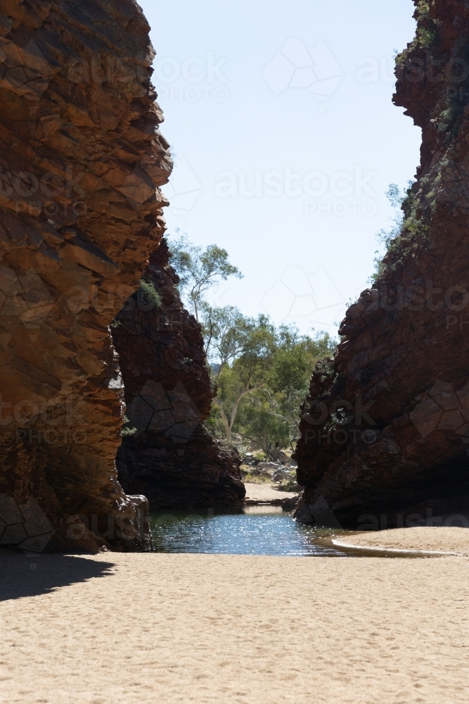A narrow gorge with steep, rocky walls. - Australian Stock Image
