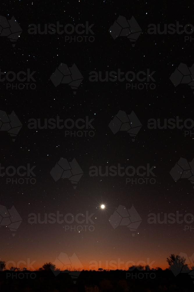 A night sky filled with stars above the horizon - Australian Stock Image