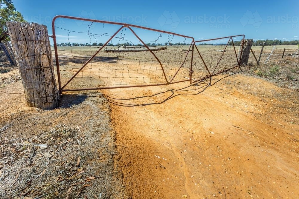Image of A pair of old farm gates - Austockphoto