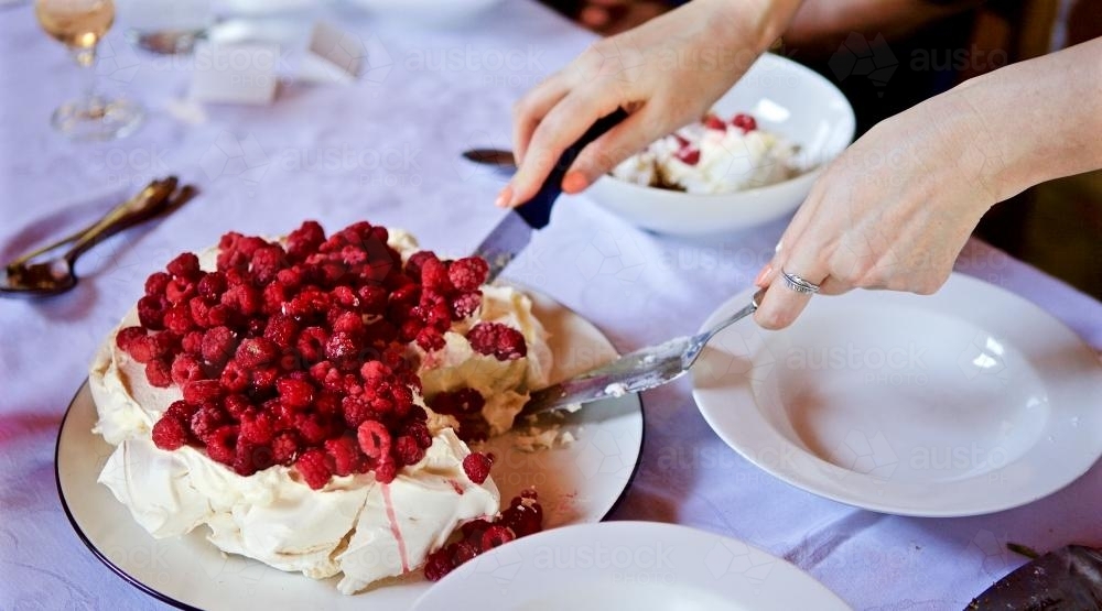 A raspberry pavlova served at Christmas lunch - Australian Stock Image
