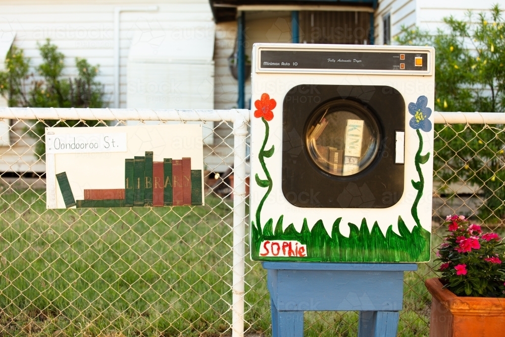 A residents old dryer used as a book swap in Winton - Australian Stock Image