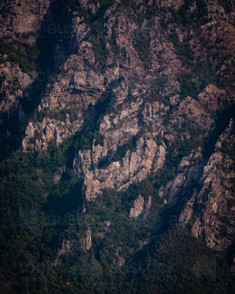 A Rugged Cliffside of a Mountain Range in Queenstown Tasmania. - Australian Stock Image