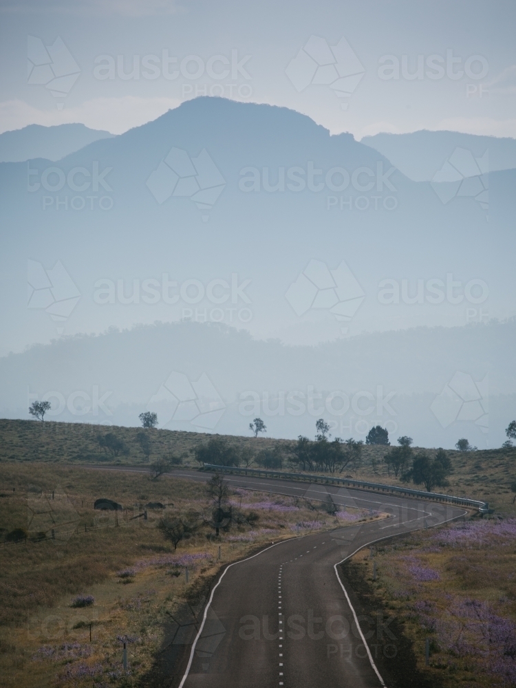 A sealed road leading through the Flinders Ranges - Australian Stock Image
