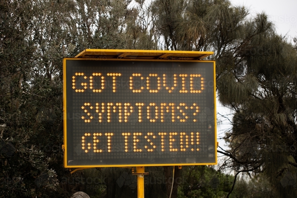 A sign during the COVID-19 corona virus pandemic which says 'Got Covid symptoms? Get tested' - Australian Stock Image