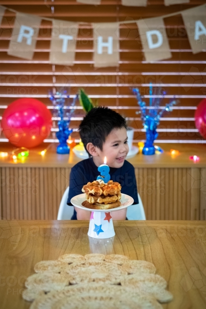 A simple but sweet waffle stack for the shy birthday boy - Australian Stock Image