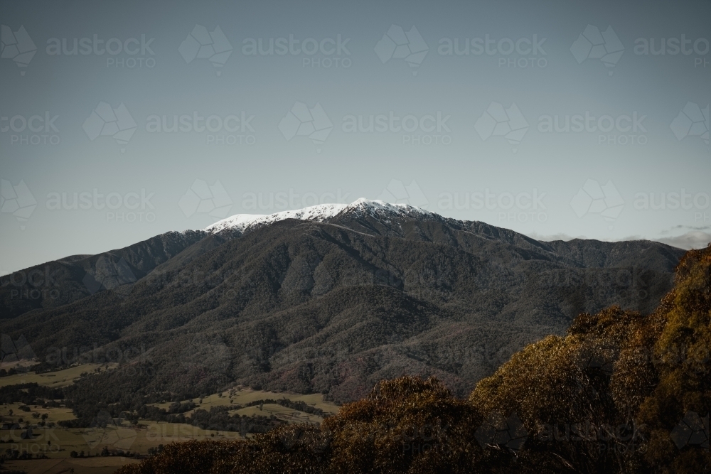 A snow-dusted Mt Bogong at the start of winter. - Australian Stock Image