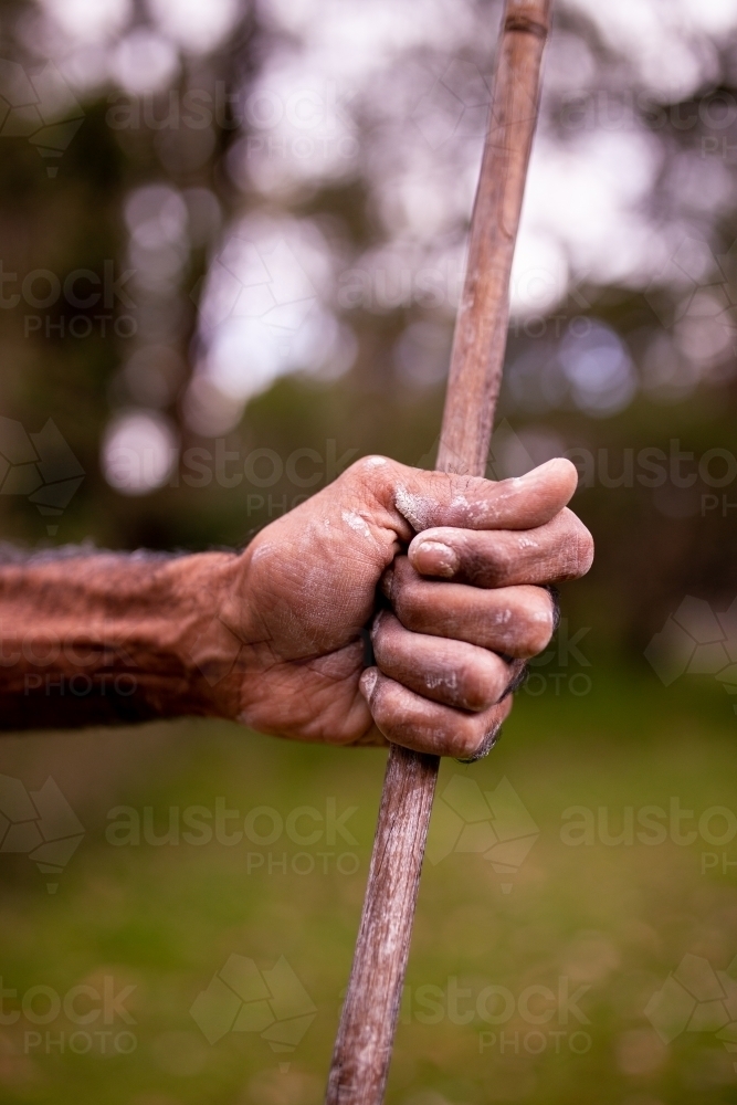 A spear held in someone's hand - Australian Stock Image