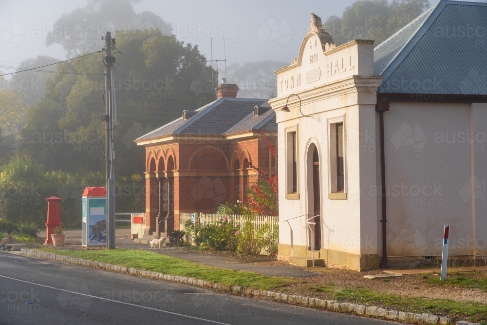 A streetscape of historic buildings on a foggy morning in Chewton, Victoria. - Australian Stock Image
