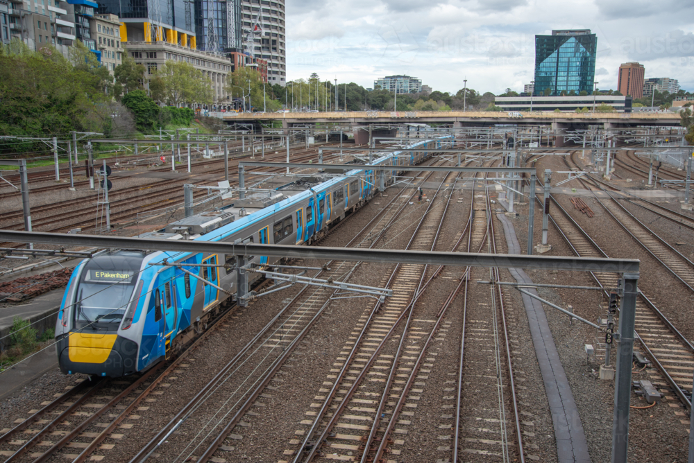 A train on the tracks near Flinders Street Station in Melbourne - Australian Stock Image