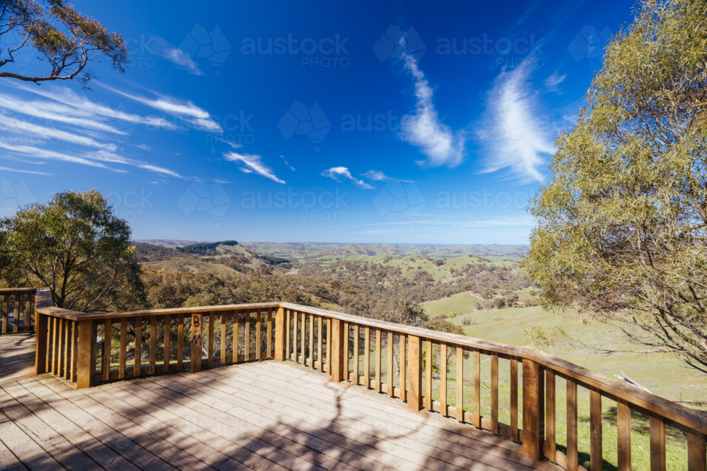A view over Strath Creek from Murchison Gap Lookout on a clear sunny spring day in Victoria - Australian Stock Image