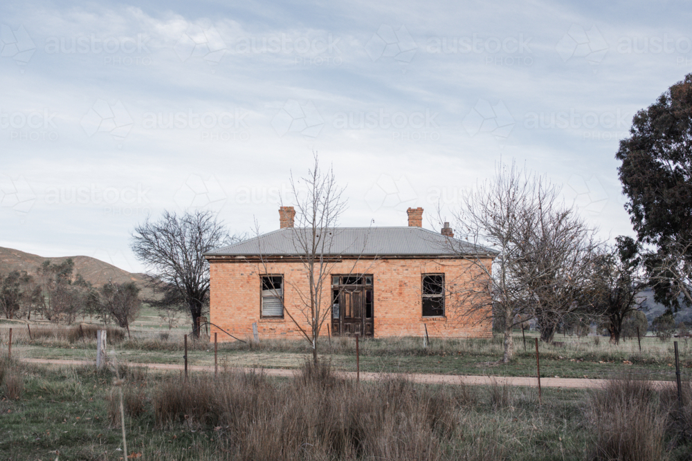 Abandoned brick house in rural location - Australian Stock Image