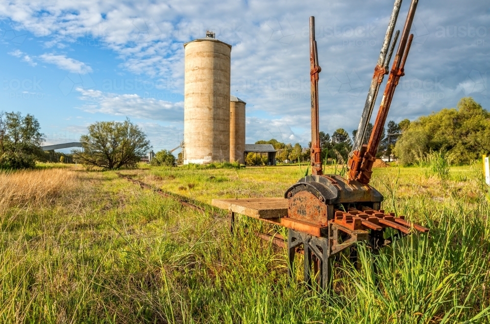 Abandoned silos after government did not repair buckled train tracks after flooding - Australian Stock Image