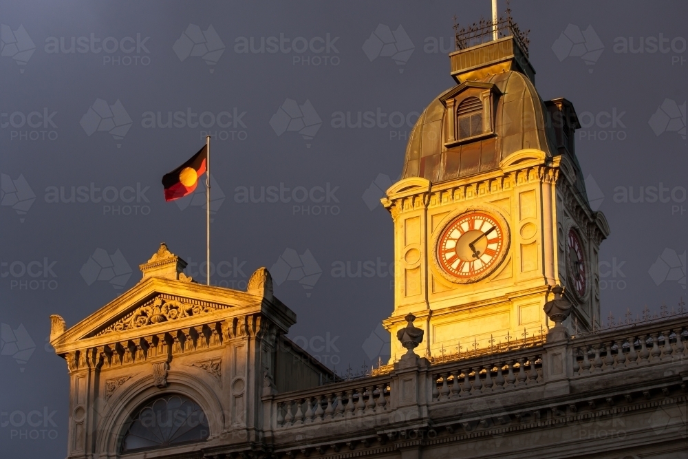 Aboriginal flag flying above a heritage building - Australian Stock Image