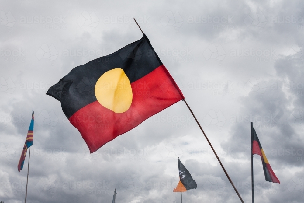 Aboriginal Flag flying in the wind - Australian Stock Image
