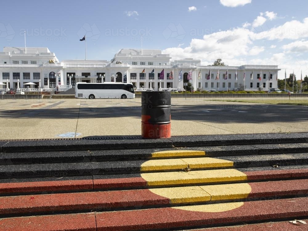 Aboriginal flag painted on steps leading to old parliament house - Australian Stock Image