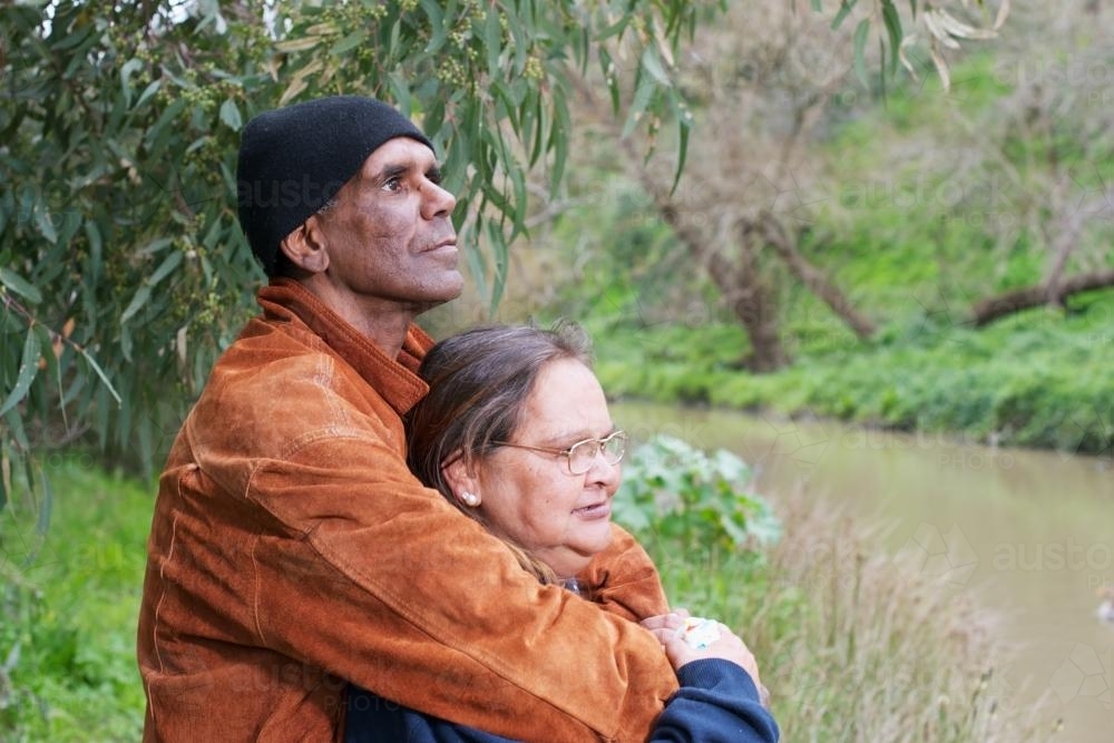 Aboriginal Man and Woman in Affectionate Pose - Australian Stock Image